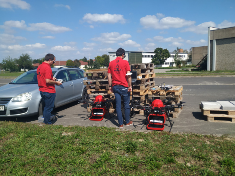 Behind the Scenes: Our Drone Tech Experts Sascha and Simon preparing the delivery drones for take off