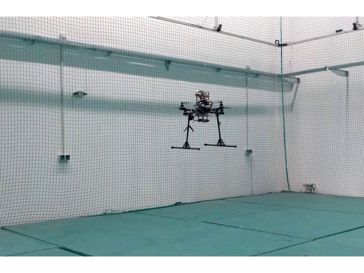 Technology testing drone in flight during tests in the flight laboratory